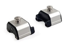 Adjustable plunger stoppers for 32mm track